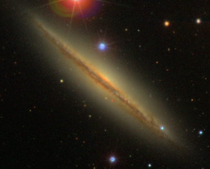 Unveiling the Mysteries of NGC 4217 : An Edge-On Spiral Galaxy